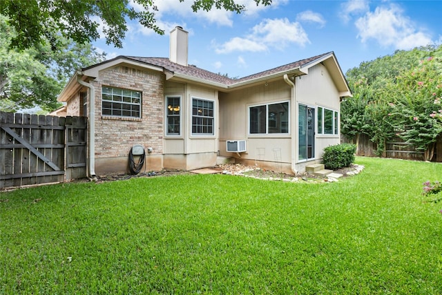 1212 Dove Cir, Cedar Park, TX 78613 - back of property with a chimney and a wall mounted air conditioner