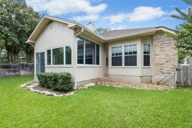 1212 Dove Cir, Cedar Park, TX 78613 - view of home's exterior featuring a chimney