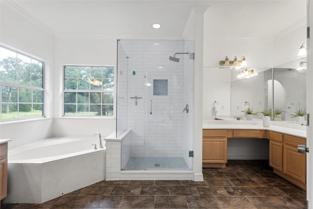 1109 Sherrill Ln, Lexington, TX 78947 - bathroom featuring vanity, a bath, a shower stall, crown molding, and stone finish floors