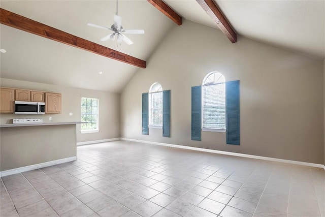 1109 Sherrill Ln, Lexington, TX 78947 - unfurnished living room with beamed ceiling, light tile patterned floors, ceiling fan, and high vaulted ceiling