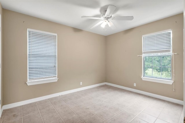 1109 Sherrill Ln, Lexington, TX 78947 - empty room with a ceiling fan and light tile patterned floors