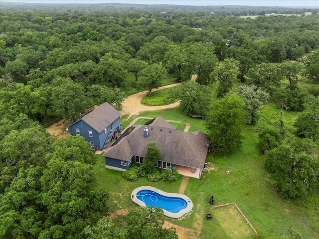 1109 Sherrill Ln, Lexington, TX 78947 - aerial view of property and surrounding area with a forest and a pool