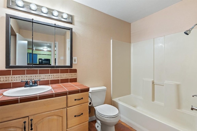 111 Sendero Blvd, Cedar Creek, TX 78612 - bathroom with decorative backsplash, vanity, and shower / washtub combination
