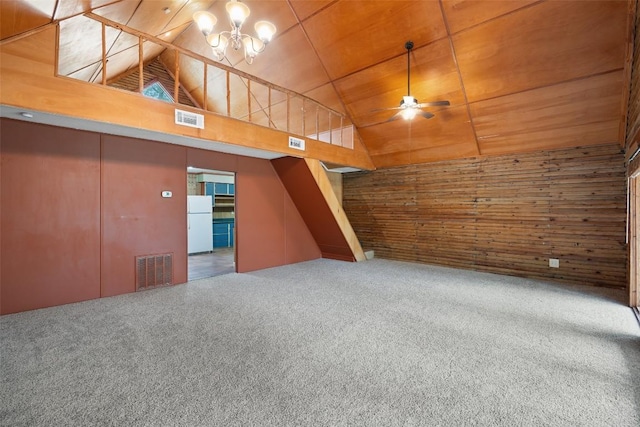 111 Sendero Blvd, Cedar Creek, TX 78612 - spare room with wooden walls, high vaulted ceiling, carpet, a ceiling fan, and wooden ceiling