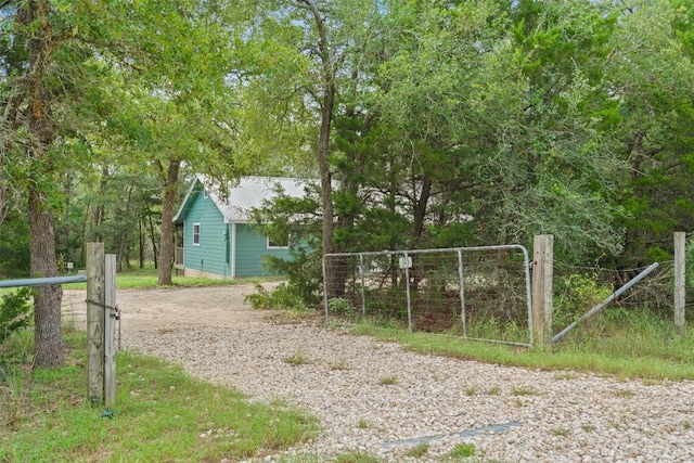 111 Sendero Blvd, Cedar Creek, TX 78612 - view of yard featuring a gate