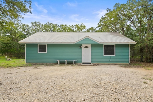 111 Sendero Blvd, Cedar Creek, TX 78612 - view of front facade with a metal roof