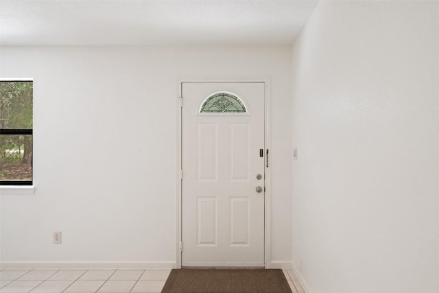 111 Sendero Blvd, Cedar Creek, TX 78612 - entrance foyer with light tile patterned floors and baseboards