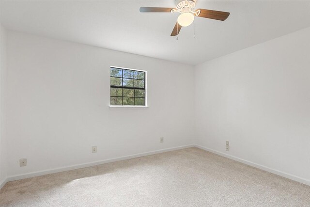 111 Sendero Blvd, Cedar Creek, TX 78612 - carpeted empty room featuring baseboards and a ceiling fan