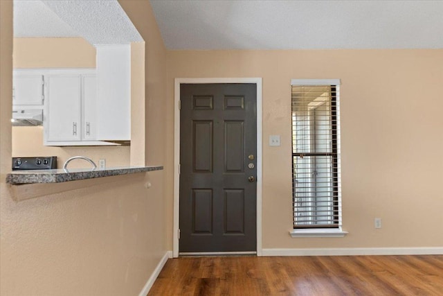 10616 Mellow Meadows Dr Unit 21C, Austin, TX 78750 - entryway featuring wood finished floors and plenty of natural light