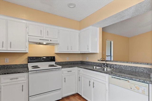 10616 Mellow Meadows Dr Unit 21C, Austin, TX 78750 - kitchen featuring white appliances, under cabinet range hood, white cabinetry, and light wood-style flooring