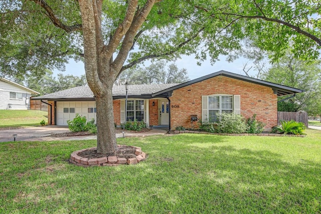 908 Hollybluff St, Austin, TX 78753 - ranch-style house featuring brick siding, an attached garage, and concrete driveway
