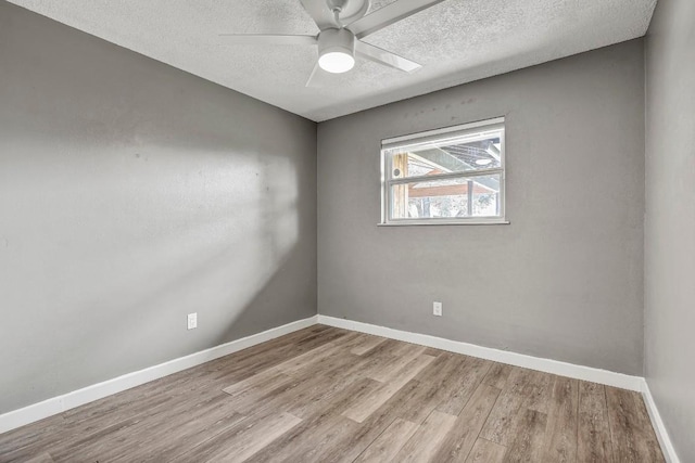 908 Hollybluff St, Austin, TX 78753 - spare room featuring a textured ceiling, wood finished floors, and ceiling fan