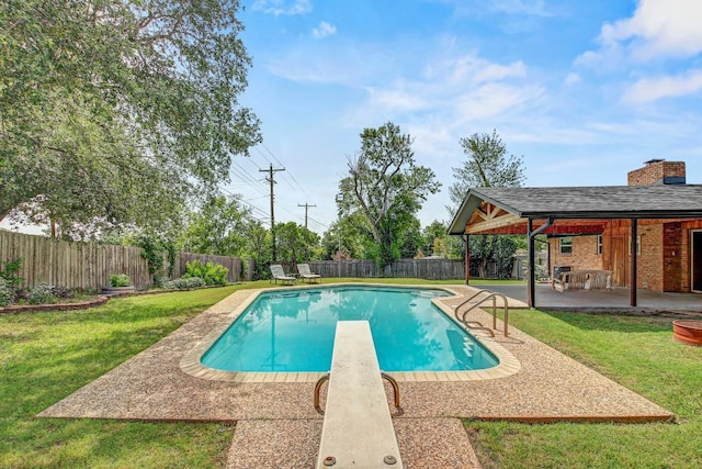 908 Hollybluff St, Austin, TX 78753 - view of swimming pool featuring a patio area, a diving board, and a fenced backyard