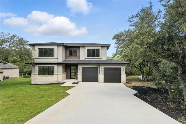 512 Cowal Dr S, Spicewood, TX 78669 - prairie-style home featuring stone siding, concrete driveway, an attached garage, and stucco siding