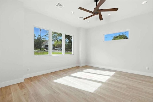 512 Cowal Dr S, Spicewood, TX 78669 - unfurnished room featuring recessed lighting, wood finished floors, and ceiling fan