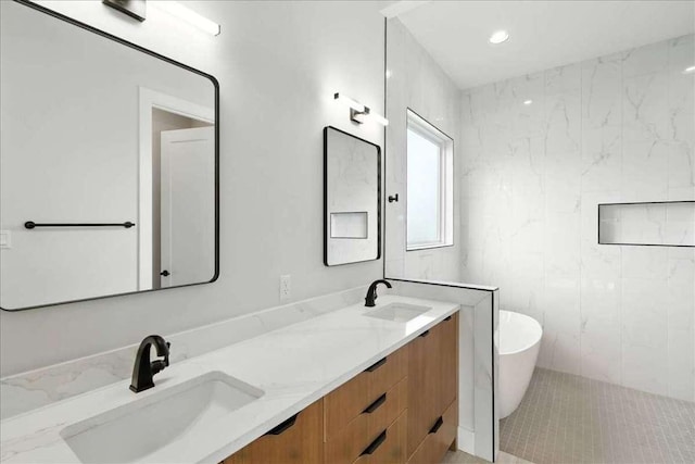 512 Cowal Dr S, Spicewood, TX 78669 - bathroom featuring a freestanding bath and double vanity