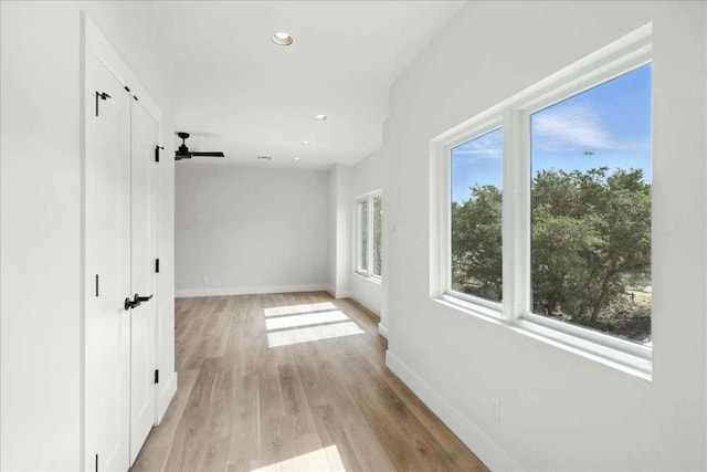 512 Cowal Dr S, Spicewood, TX 78669 - hall featuring light wood-type flooring and recessed lighting