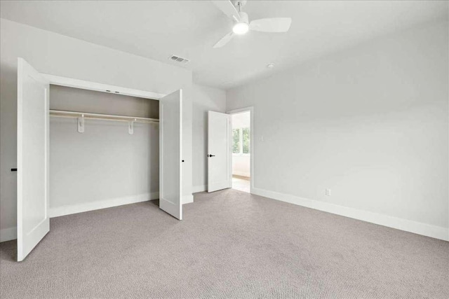 512 Cowal Dr S, Spicewood, TX 78669 - unfurnished bedroom with a closet, carpet flooring, and ceiling fan