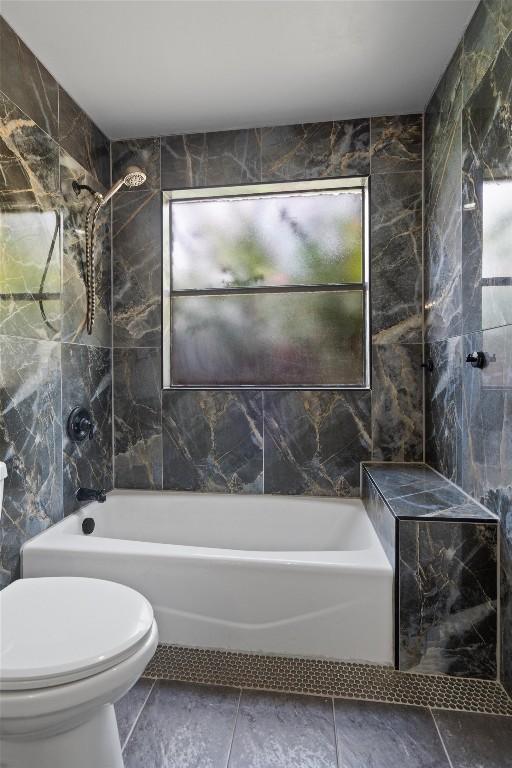 1707 Creek Bend Cir, Round Rock, TX 78681 - full bathroom with tub / shower combination and tile walls