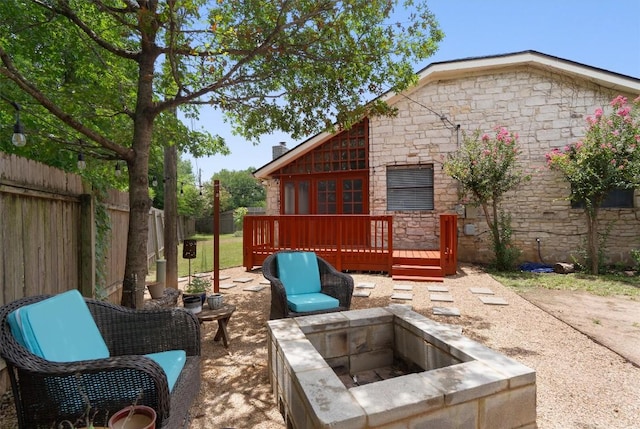 1707 Creek Bend Cir, Round Rock, TX 78681 - view of patio / terrace with a deck and an outdoor fire pit