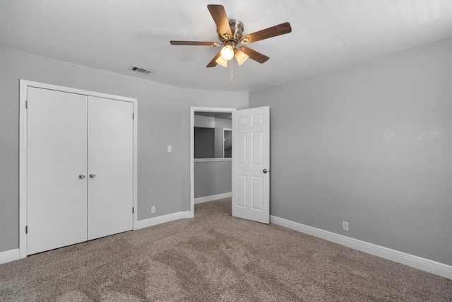 1707 Creek Bend Cir, Round Rock, TX 78681 - unfurnished bedroom featuring carpet, a closet, and a ceiling fan