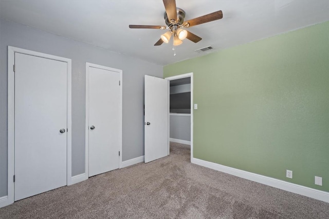 1707 Creek Bend Cir, Round Rock, TX 78681 - unfurnished bedroom featuring carpet flooring and a ceiling fan