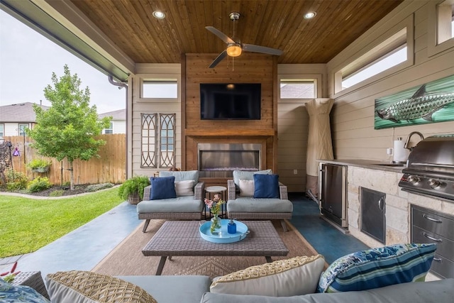 6708 Leonardo Dr, Round Rock, TX 78665 - view of patio / terrace featuring an outdoor living space with a fireplace, area for grilling, and a ceiling fan