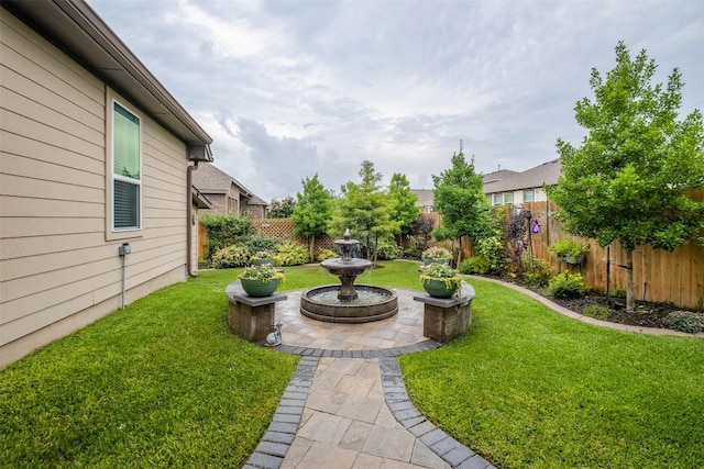 6708 Leonardo Dr, Round Rock, TX 78665 - fenced backyard with a patio area