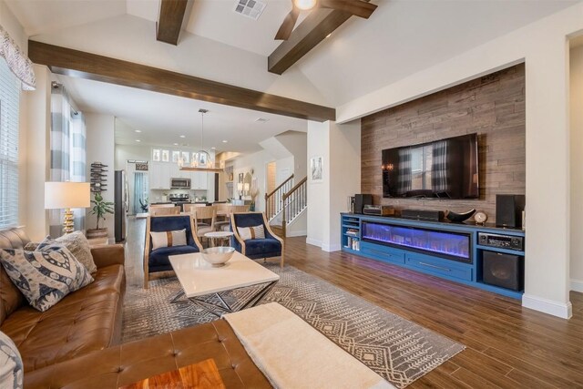 6708 Leonardo Dr, Round Rock, TX 78665 - living area with dark wood-type flooring, recessed lighting, a chandelier, and stairs