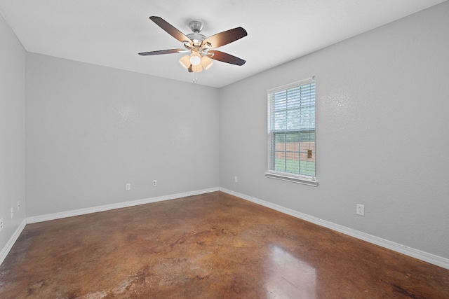 5700 Jain Ln, Austin, TX 78721 - spare room with finished concrete floors and a ceiling fan