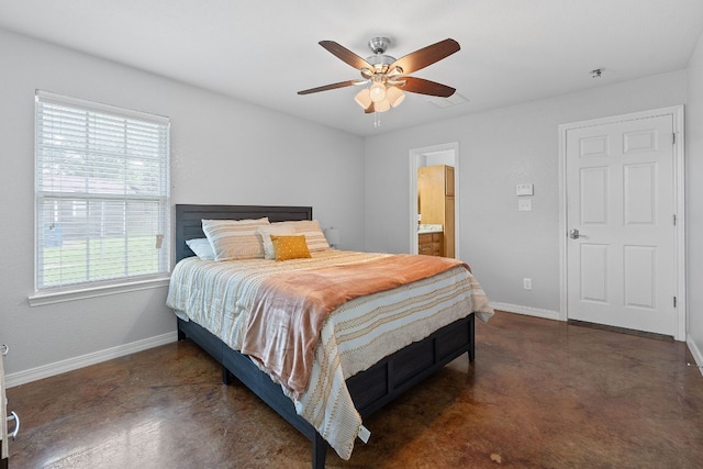 5700 Jain Ln, Austin, TX 78721 - bedroom with a ceiling fan, concrete floors, and ensuite bath