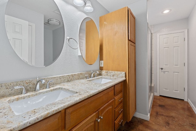 5700 Jain Ln, Austin, TX 78721 - full bath featuring double vanity and a shower with door