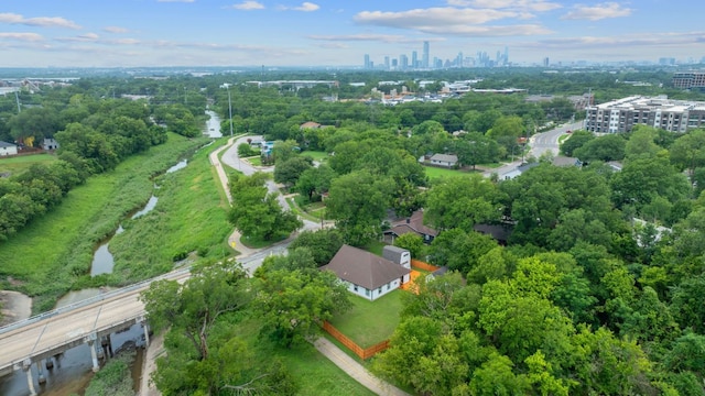 5700 Jain Ln, Austin, TX 78721 - aerial view of city skyline and a tree filled landscape