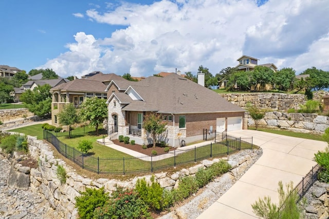 2304 Arroyo Grande, Leander, TX 78641 - view of front of house with stone siding, driveway, a garage, a fenced front yard, and a chimney
