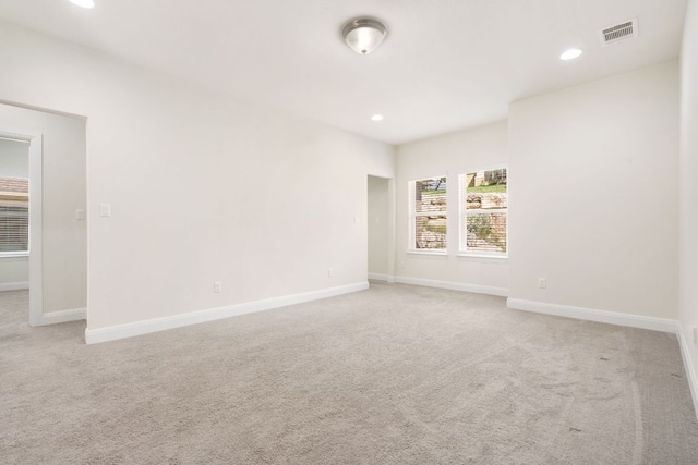 2304 Arroyo Grande, Leander, TX 78641 - empty room featuring light colored carpet and recessed lighting
