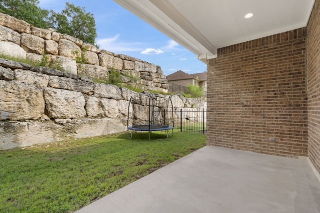 2304 Arroyo Grande, Leander, TX 78641 - view of yard with a trampoline and a patio