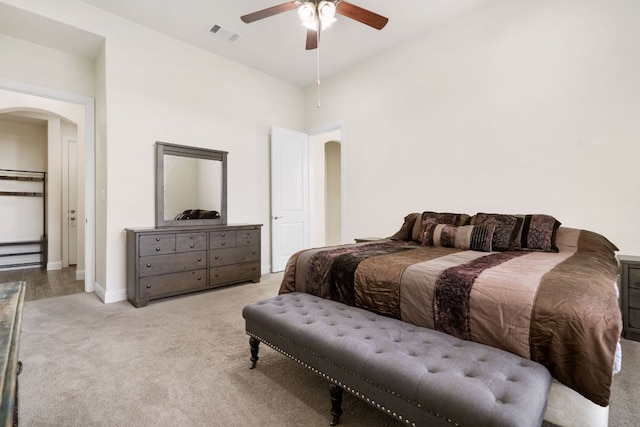 2304 Arroyo Grande, Leander, TX 78641 - bedroom with arched walkways, carpet floors, and ceiling fan