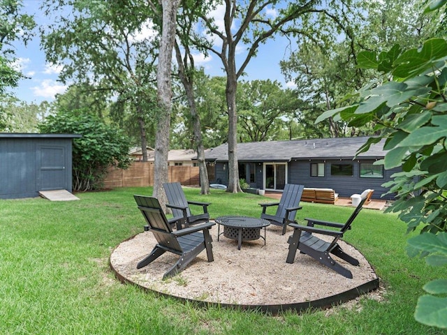 1907 Parkside Ln, Austin, TX 78745 - view of yard with a fire pit and a storage unit