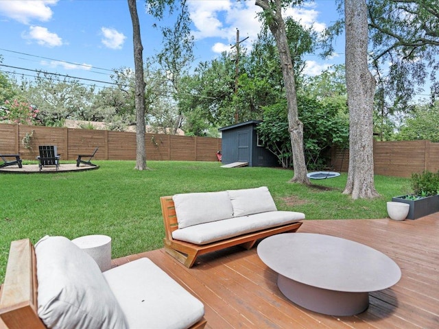 1907 Parkside Ln, Austin, TX 78745 - wooden deck featuring a fenced backyard and a shed