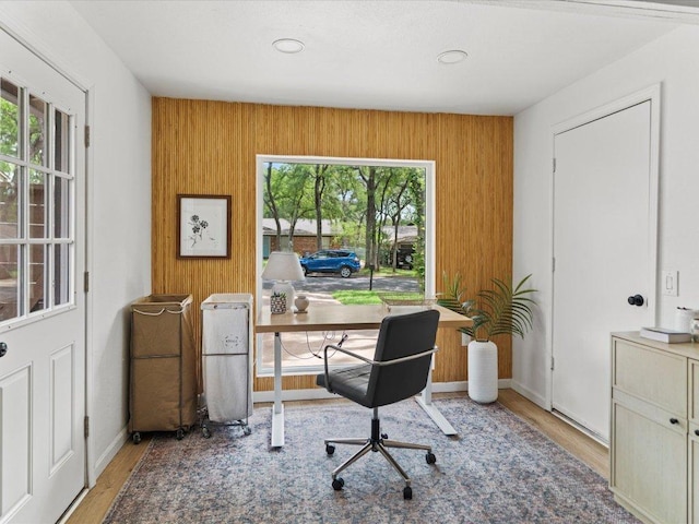 1907 Parkside Ln, Austin, TX 78745 - home office with wood finished floors and wood walls