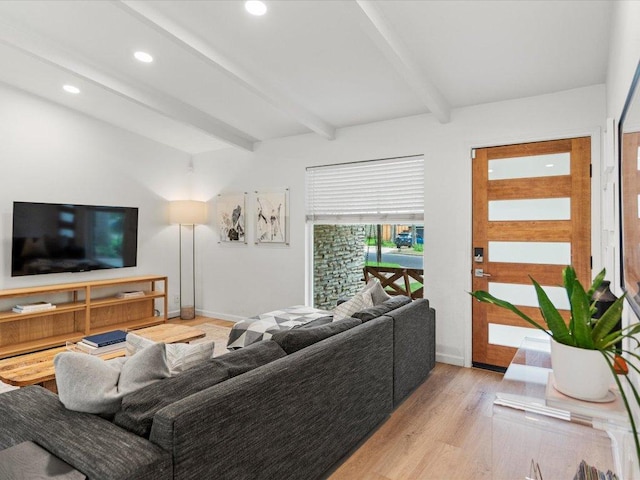 1907 Parkside Ln, Austin, TX 78745 - living room featuring beam ceiling, wood finished floors, and recessed lighting