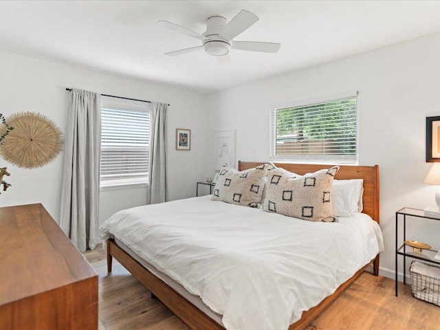 1907 Parkside Ln, Austin, TX 78745 - bedroom featuring wood finished floors and ceiling fan
