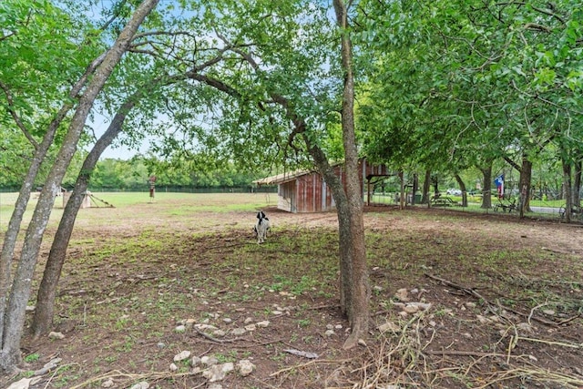 1907 Parkside Ln, Austin, TX 78745 - view of yard with an outbuilding