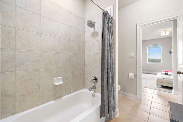 1304 Positano Pass, Leander, TX 78641 - ensuite bathroom with shower / bath combo with shower curtain and tile patterned flooring
