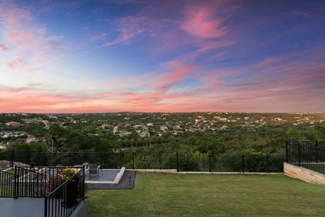 1304 Positano Pass, Leander, TX 78641 - yard at dusk with a patio