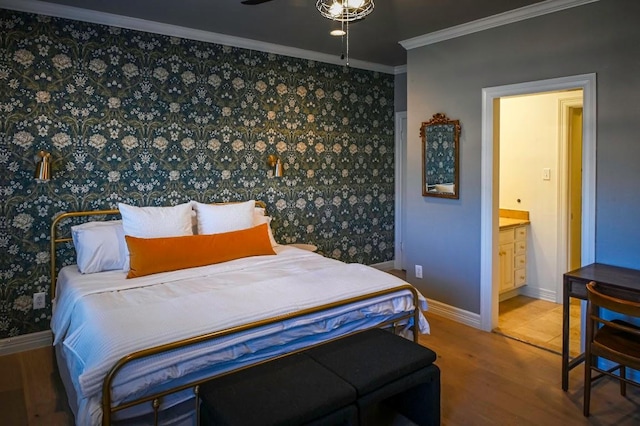 4119 Hidden Canyon Cv, Austin, TX 78746 - bedroom with wood finished floors, crown molding, and connected bathroom