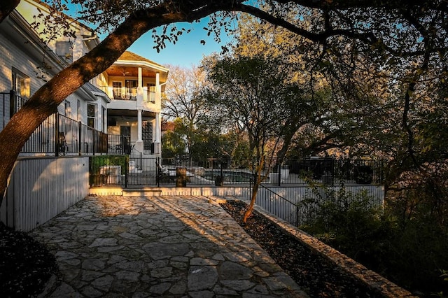 4119 Hidden Canyon Cv, Austin, TX 78746 - patio / terrace with a fenced front yard and a gate