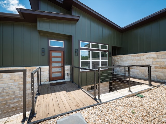 3013 Clark Ave, Lago Vista, TX 78645 - entrance to property with board and batten siding and stone siding