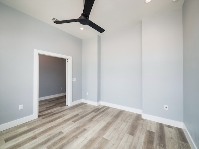 3013 Clark Ave, Lago Vista, TX 78645 - empty room with a ceiling fan, wood finished floors, and recessed lighting