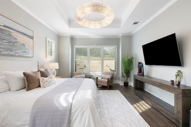 209 Ringtail Stream Dr, Lakeway, TX 78738 - bedroom featuring multiple windows, wood finished floors, a tray ceiling, and crown molding